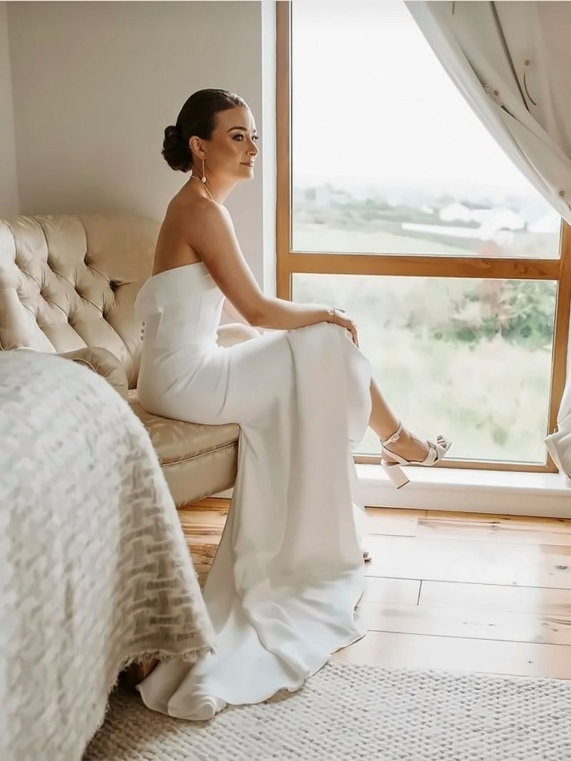 Low sleek bun bridal hair in Dingle, County Kerry